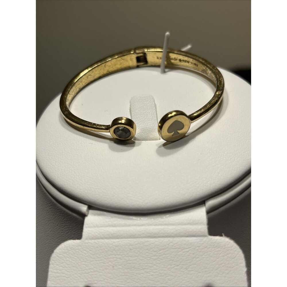 Kate Spade New York Spot The Spade Gold Tone White Enamel Hinged Cuff Bracelet - Picture 1 of 5